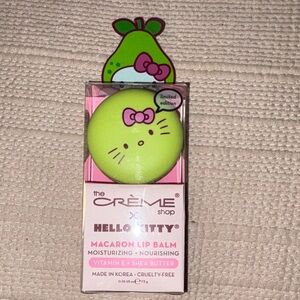 The Créme Shop X Hello Kitty Juicy Pear Macaron Lip Balm 0.26oz Limited Edition.